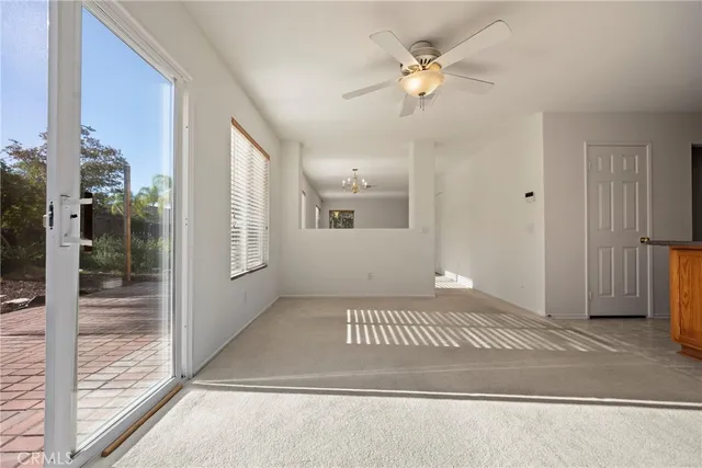 a view of a hallway with a livingroom