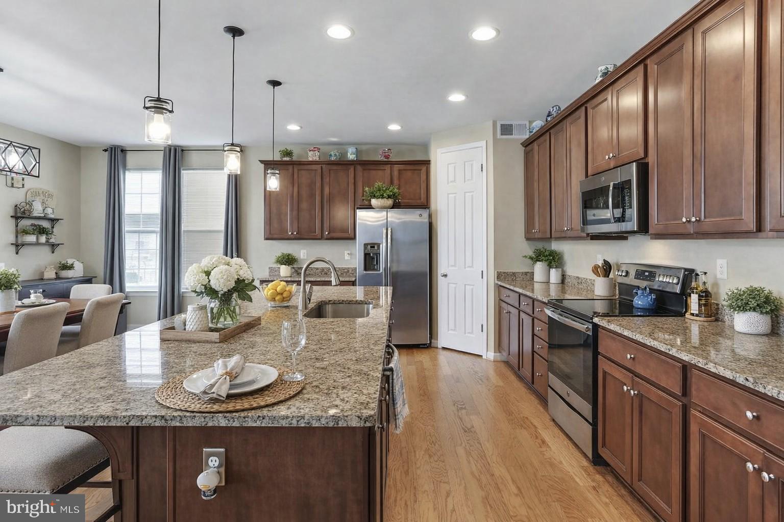 128 Sparkling Brook Road Ranson, WV 25438 - Photo 48 of 57 Modern kitchen with elegant finishes.