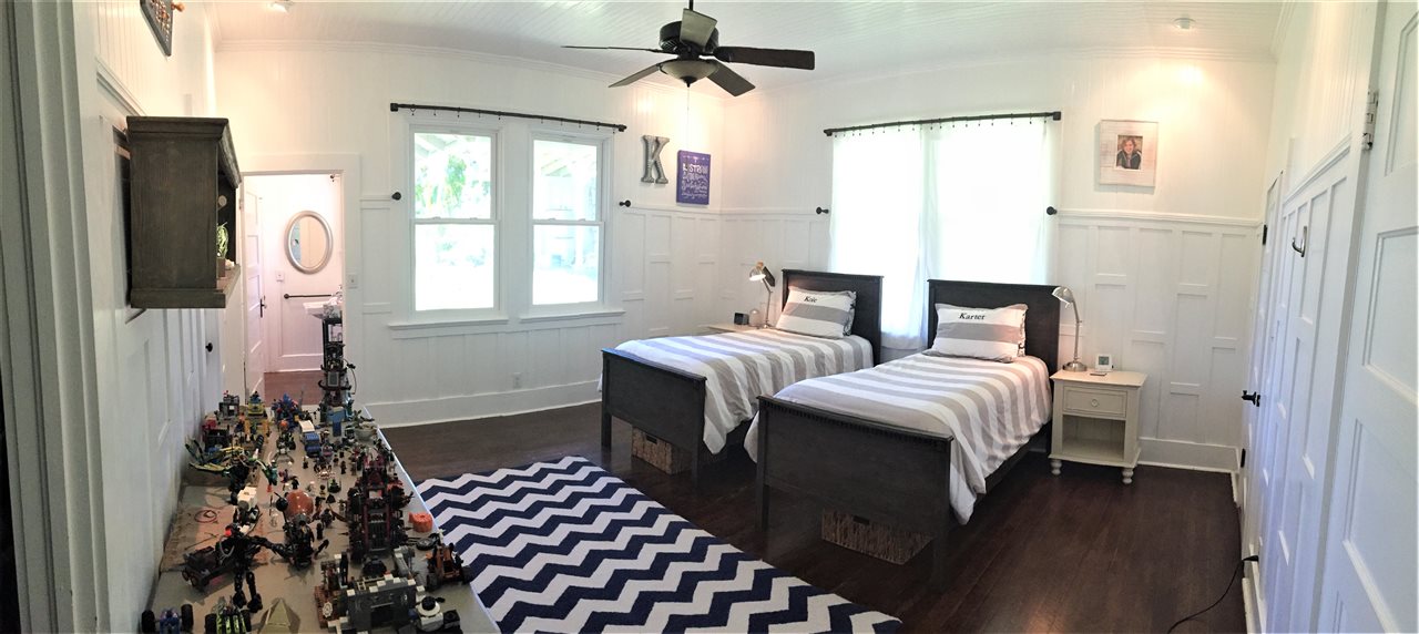 1061 Kokomo Road Haiku, HI 96708 - Photo 13 of 30 a bedroom with a bed and a window