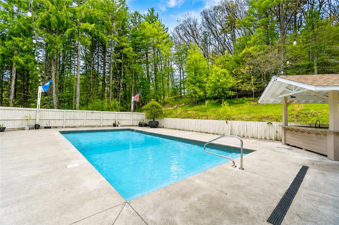 135 Haney Road Kunkletown, PA 18058 - Photo 5 of 53 a view of a swimming pool with a patio and a yard