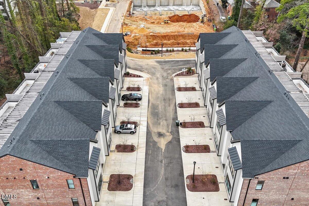 811 Maple Berry Lane, Unit 101 Raleigh, NC 27607 - Photo 45 of 45 an aerial view of residential houses with outdoor space