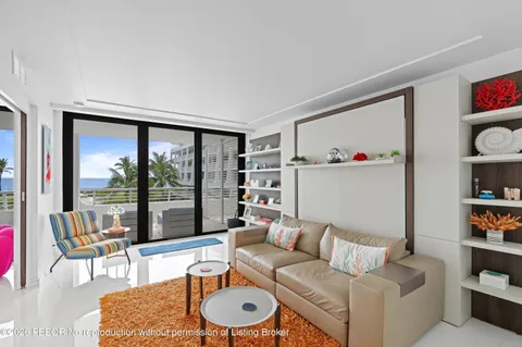 a view of swimming pool with a patio