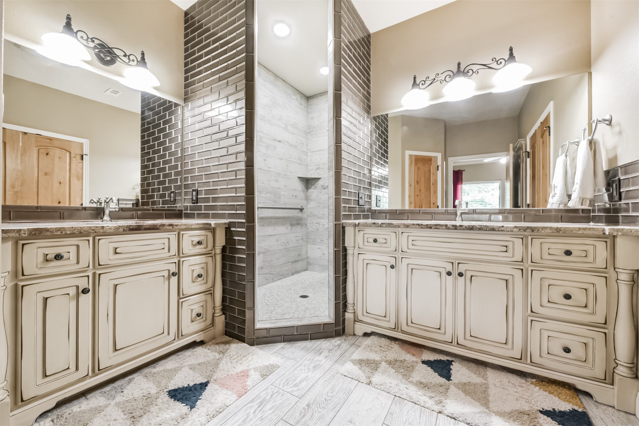 46 Deer Ridge Cleveland, TX 77327 - Photo 20 of 40 a bathroom with a sink vanity and mirror