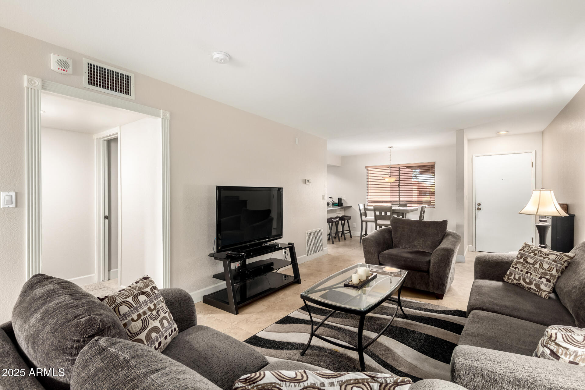 4303 East Cactus Road, Unit 408 Phoenix, AZ 85032 - Photo 12 of 33 12 Living Room