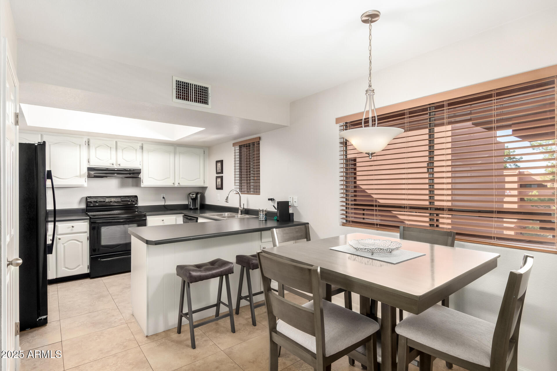 4303 East Cactus Road, Unit 408 Phoenix, AZ 85032 - Photo 8 of 33 08 Kitchen/Dining Room