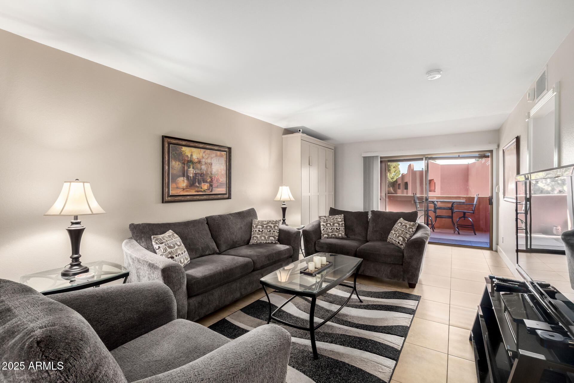 4303 East Cactus Road, Unit 408 Phoenix, AZ 85032 - Photo 10 of 33 10 Living Room