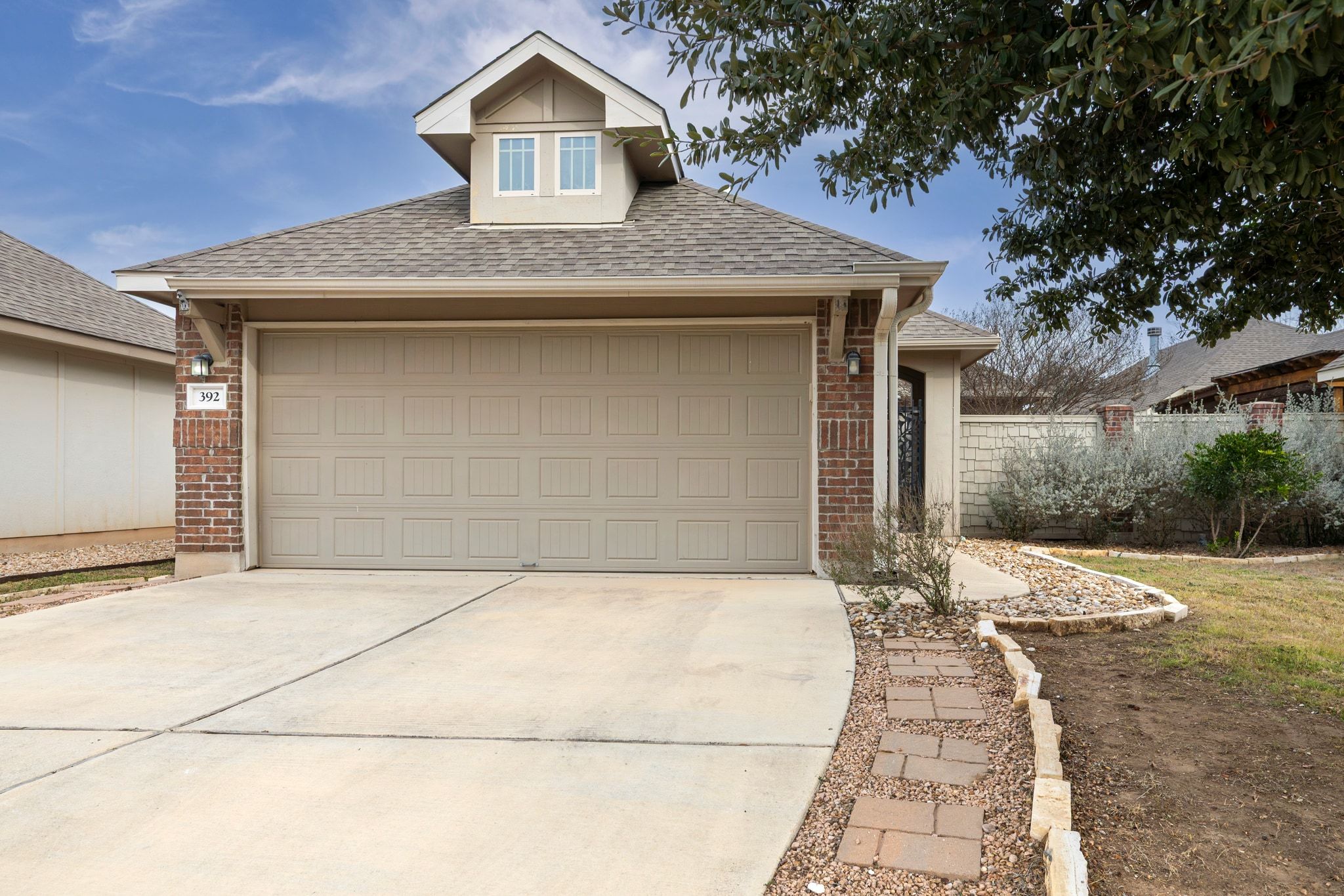392 Tilly Lane Buda, TX 78610 - Photo 1 of 1 a front view of house with yard