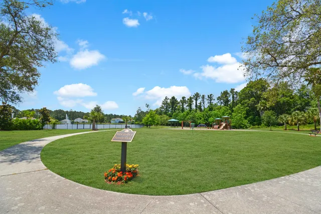 a view of a golf course with a fountain