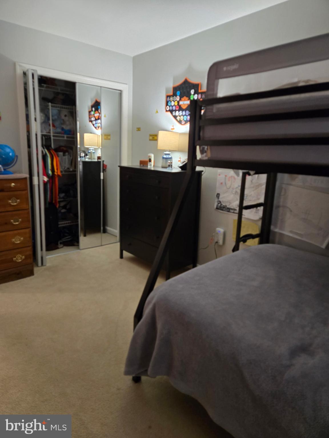 7879 Apache Ridge Court Manassas, VA 20109 - Photo 12 of 22 a bedroom with a bed and a closet