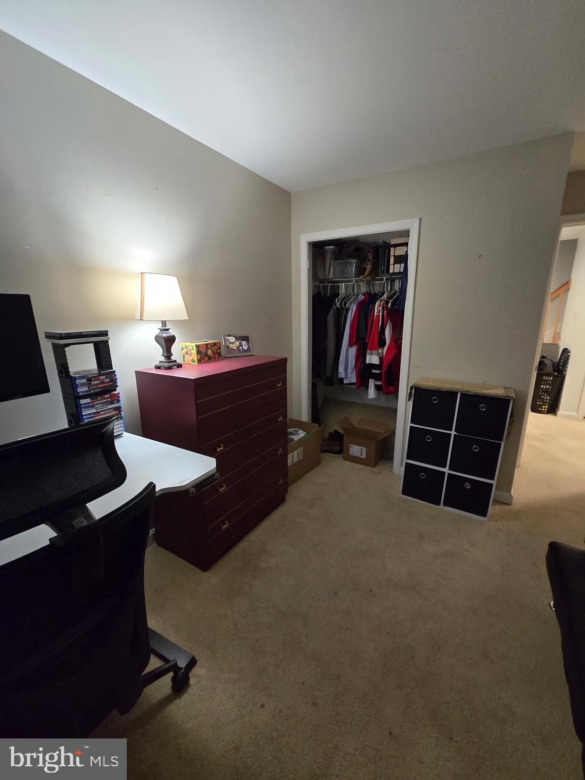 7879 Apache Ridge Court Manassas, VA 20109 - Photo 15 of 22 a room with furniture a lamp and a window