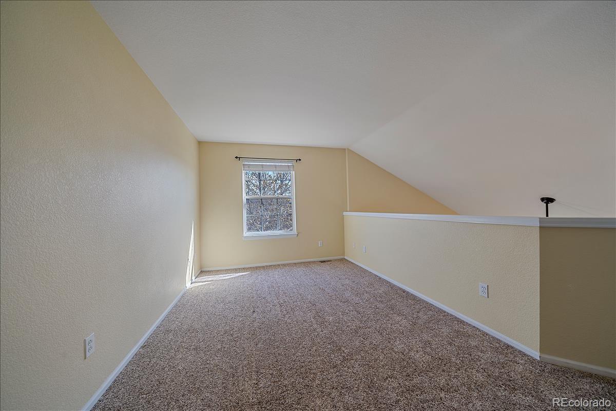 6310 Trailhead Road Highlands Ranch, CO 80130 - Photo 11 of 23 a view of an empty room with a window