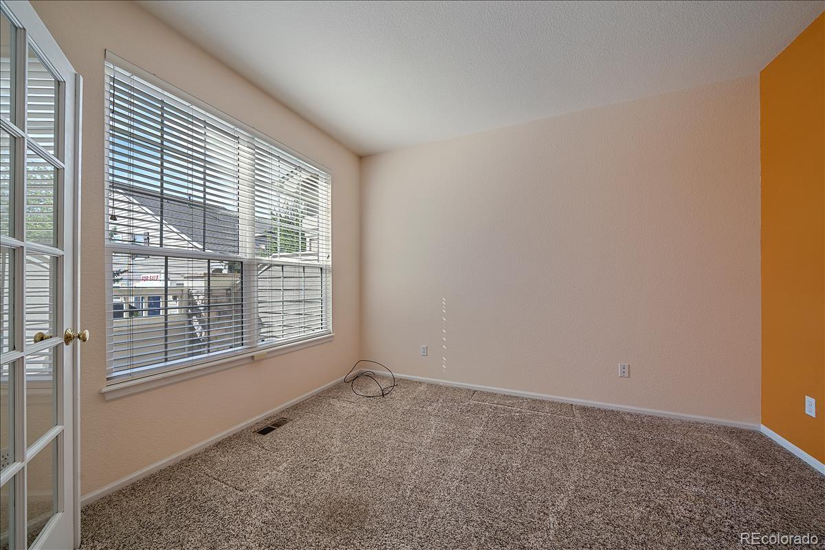 6310 Trailhead Road Highlands Ranch, CO 80130 - Photo 8 of 23 a view of an empty room with a window