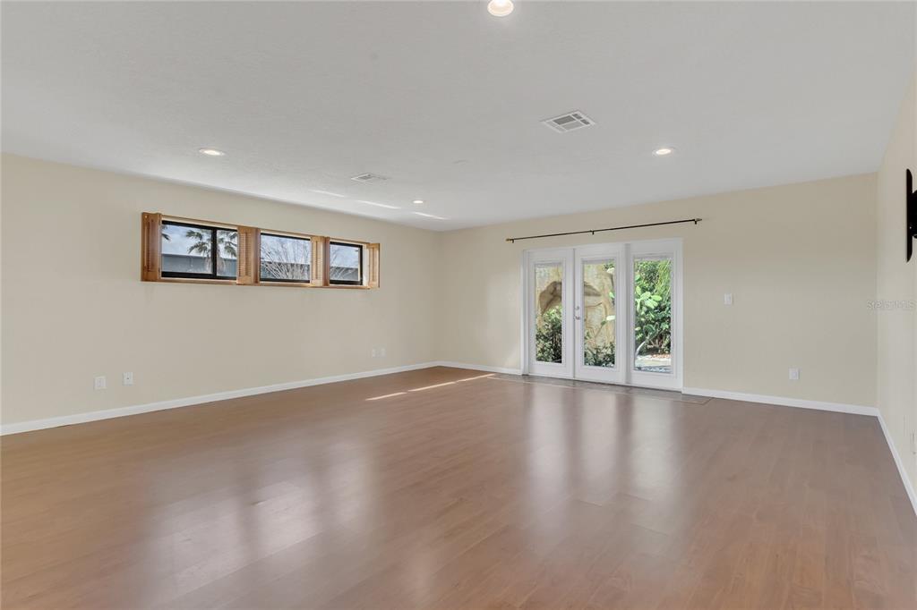 4807 Booth Road Plant City, FL 33565 - Photo 26 of 90 The spacious primary bedroom with doors out to the lanai