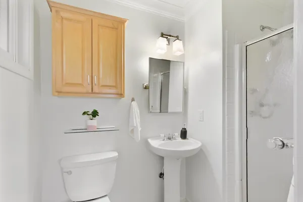 a bathroom with a sink and shower