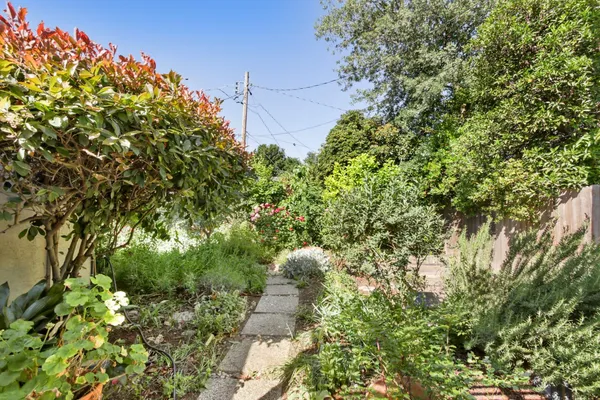 a backyard of a house with lots of green space