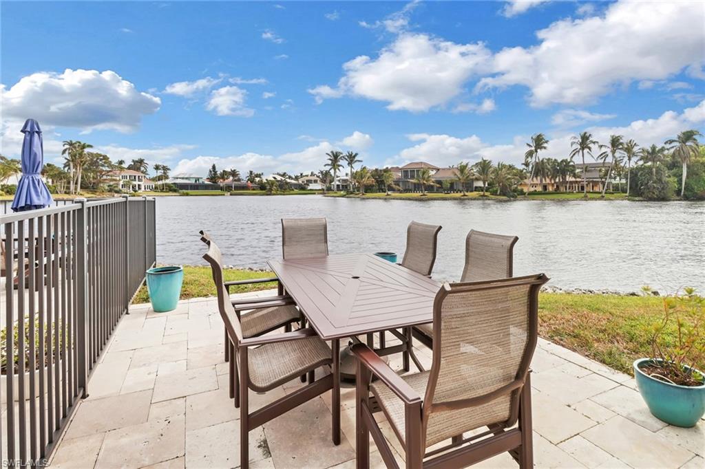 4150 Crayton Road, Unit B3 Naples, FL 34103 - Photo 17 of 19 a view of a terrace with furniture