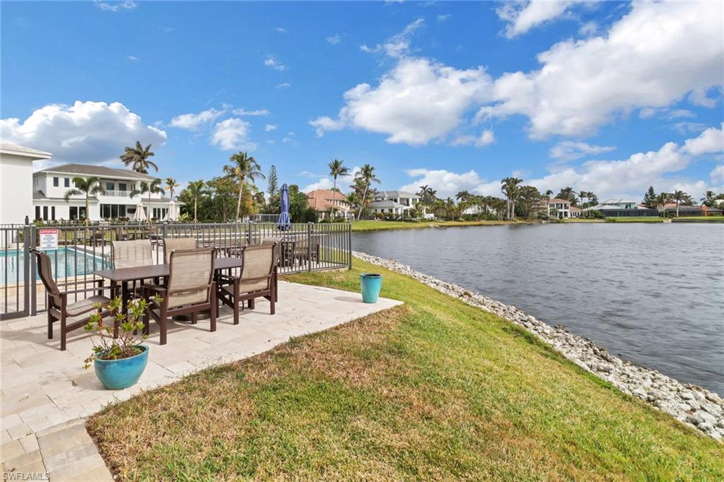 4150 Crayton Road, Unit B3 Naples, FL 34103 - Photo 18 of 19 an outdoor space with furniture and city view