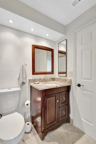 a bathroom with a bathtub and toilet