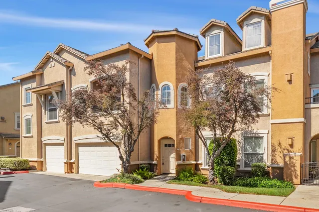 front view of a house with a street