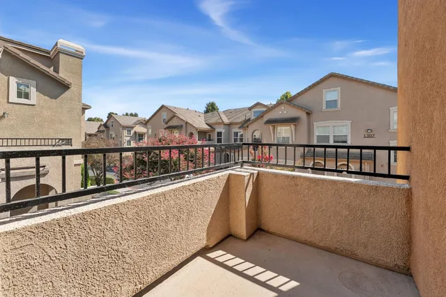 a view of a building with a swimming pool