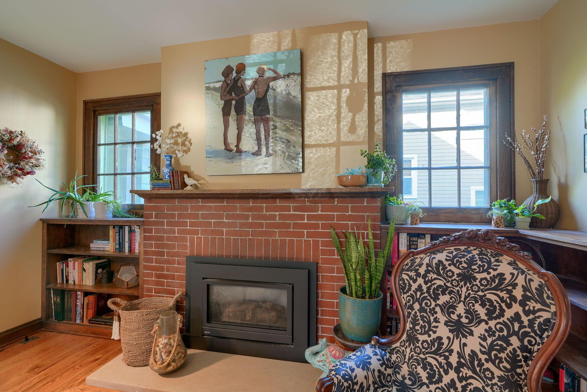 192 Acton Road Columbus, OH 43214 - Photo 18 of 60 Cozy gas logs and built in book shelves pair nicely for evening reading