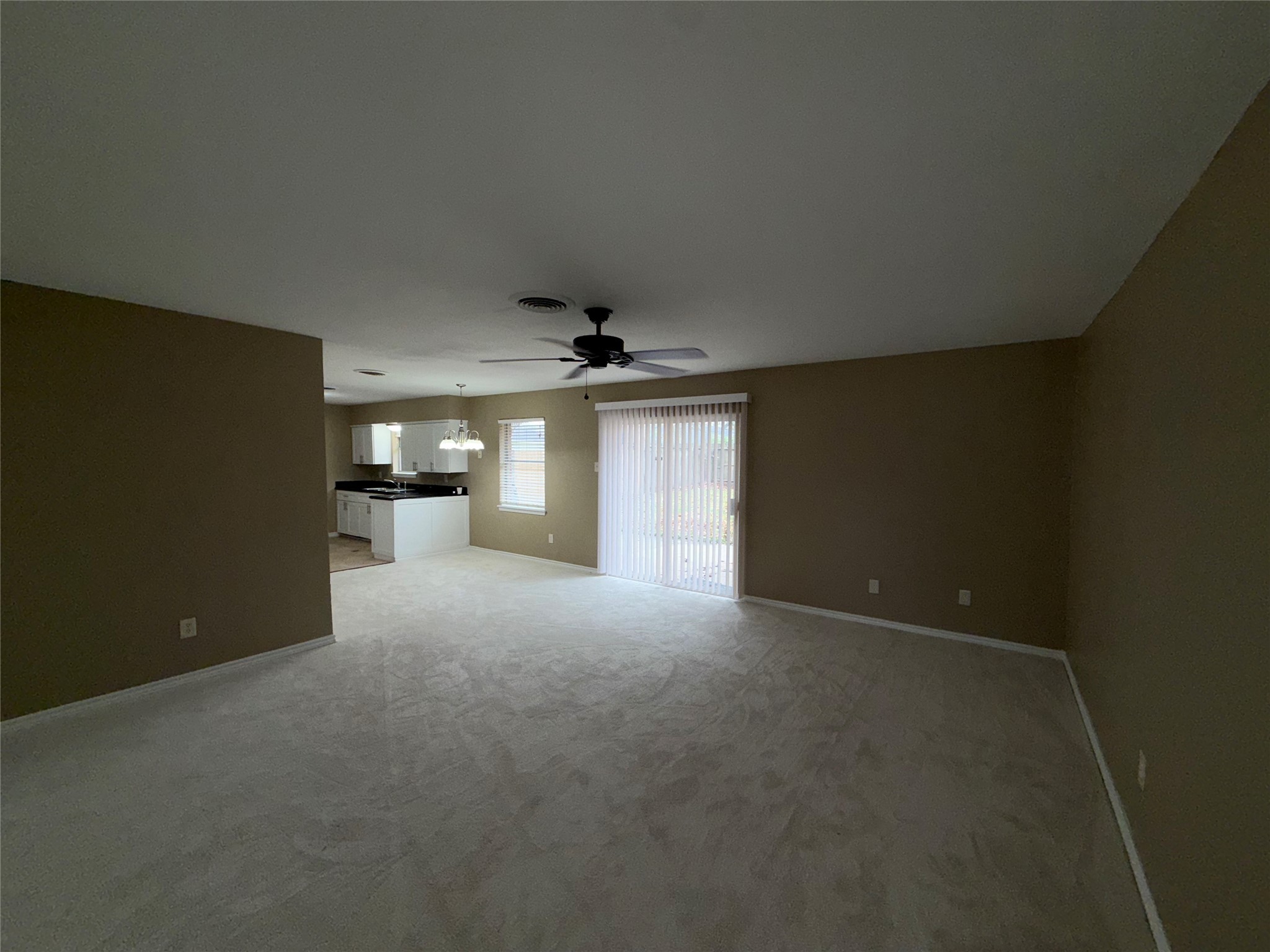 7306 Troulon Drive Houston, TX 77074 - Photo 12 of 16 a view of a livingroom and a kitchen with a sink