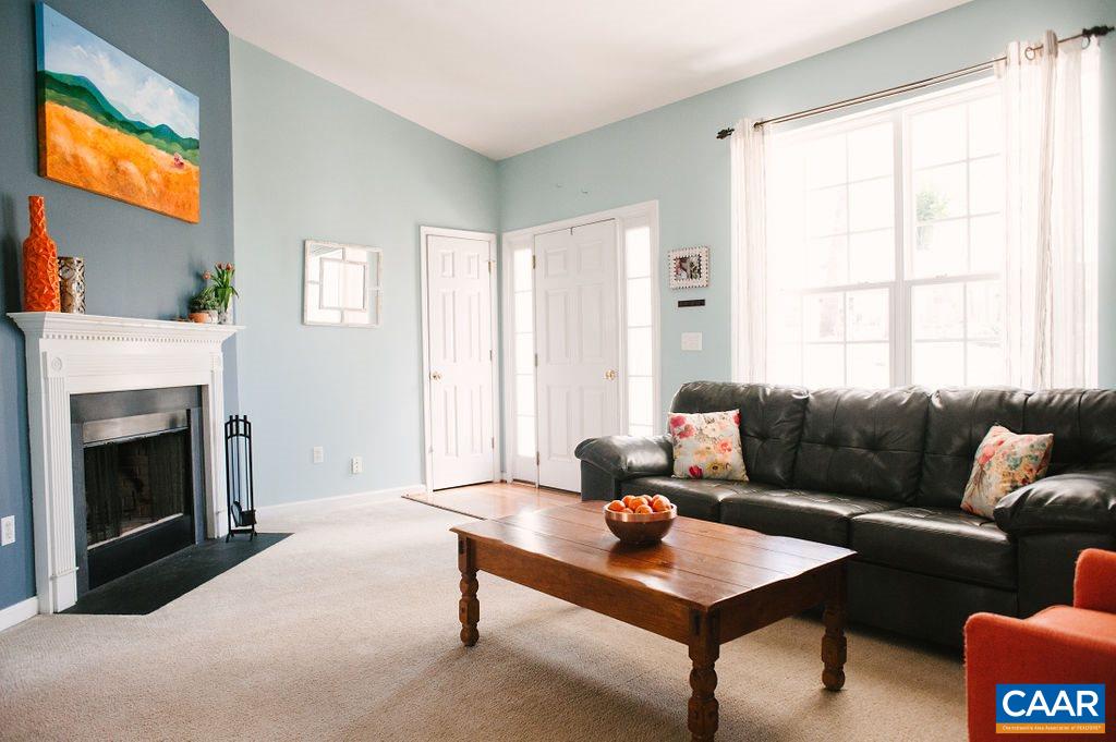 141 Tulip Road Ruckersville, VA 22968 - Photo 12 of 47 a living room with furniture and a fireplace