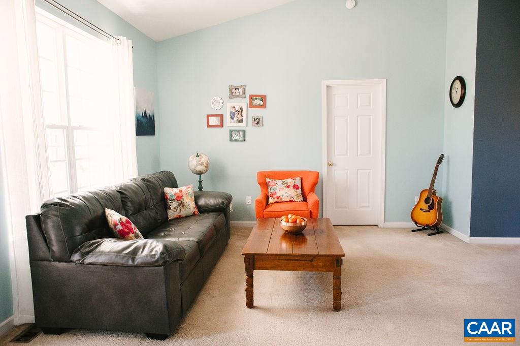141 Tulip Road Ruckersville, VA 22968 - Photo 14 of 47 a living room with furniture and a window