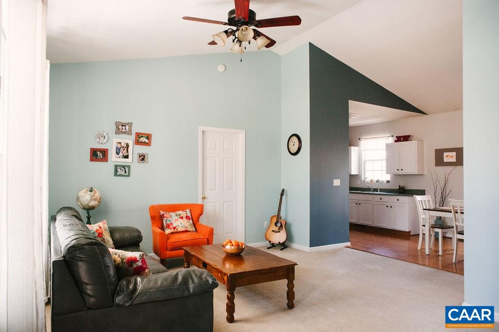 141 Tulip Road Ruckersville, VA 22968 - Photo 15 of 47 a living room with furniture and kitchen view