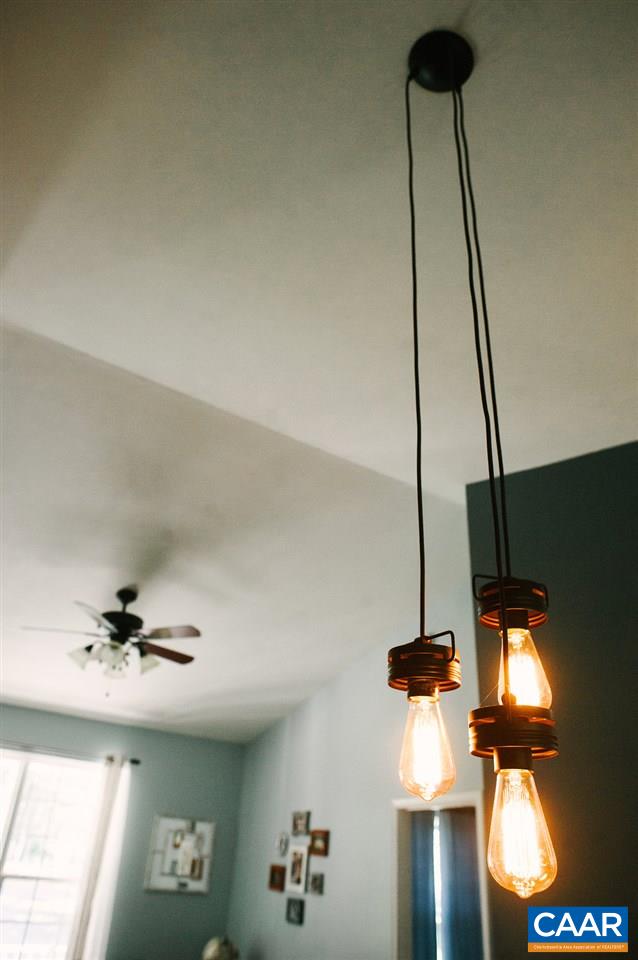 141 Tulip Road Ruckersville, VA 22968 - Photo 18 of 47 a view of hall way with furniture and chandelier