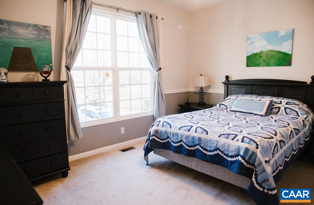 141 Tulip Road Ruckersville, VA 22968 - Photo 24 of 47 a bedroom with a bed and window