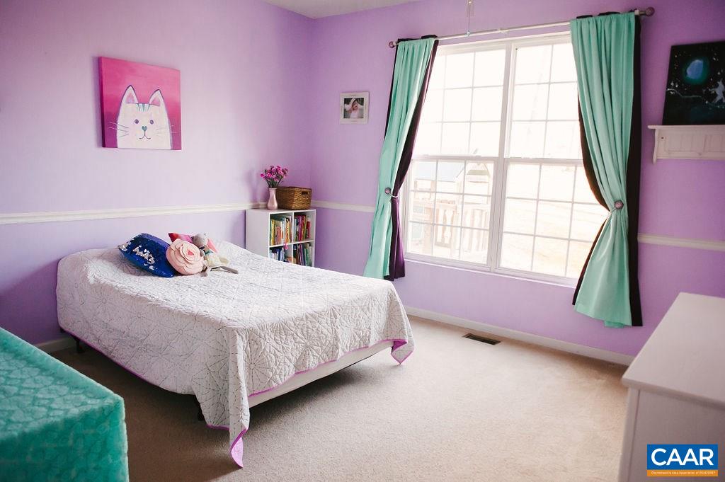 141 Tulip Road Ruckersville, VA 22968 - Photo 30 of 47 a bedroom with a bed and a window