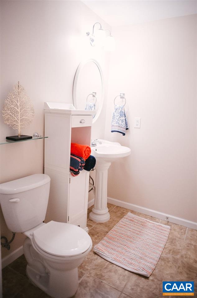 141 Tulip Road Ruckersville, VA 22968 - Photo 47 of 47 a bathroom with a toilet and a sink
