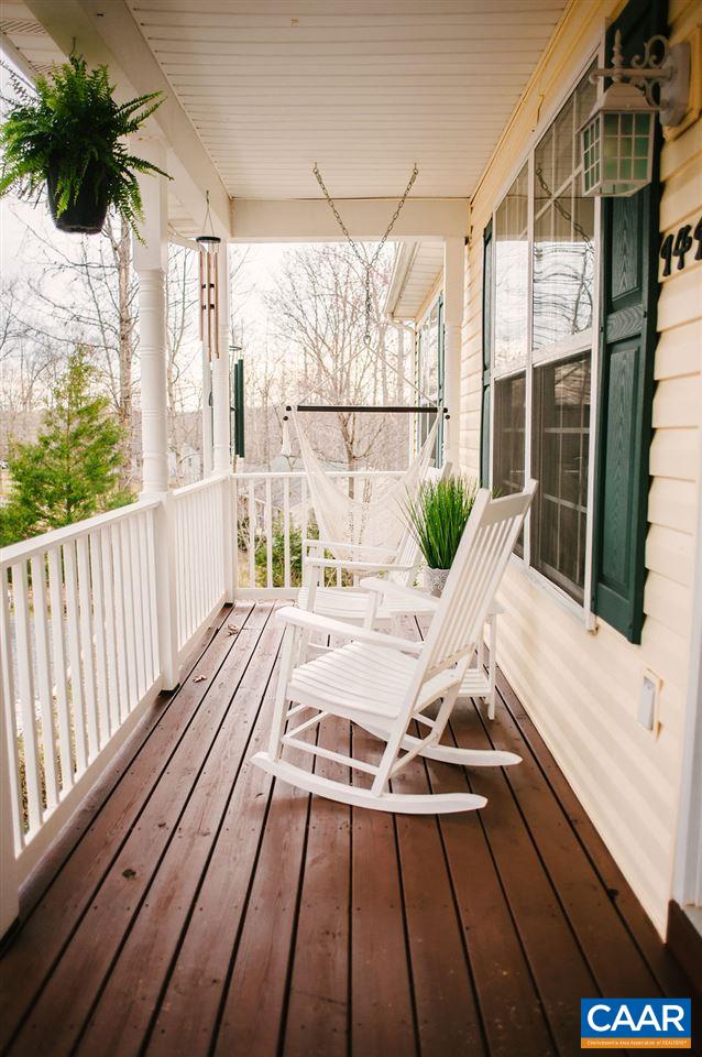 141 Tulip Road Ruckersville, VA 22968 - Photo 8 of 47 a view of balcony with wooden floor and outdoor seating