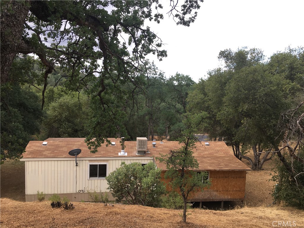 3302 Windy Hollow Road Mariposa, CA 95338 - Photo 2 of 13 a view of a house with a yard
