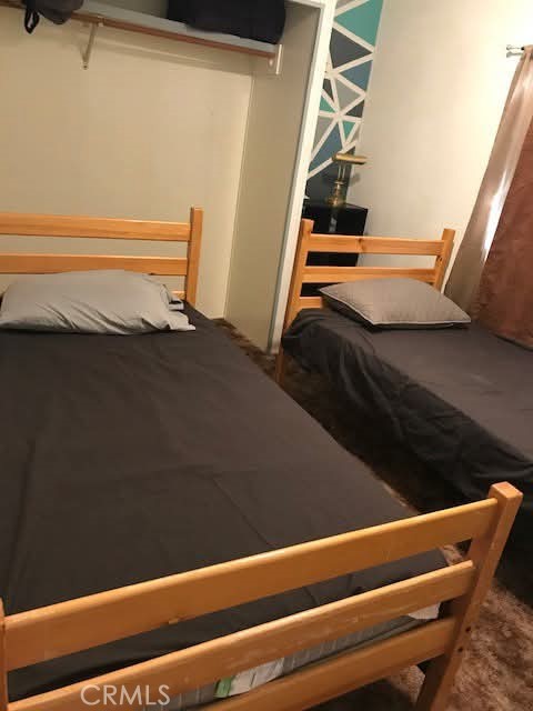 3302 Windy Hollow Road Mariposa, CA 95338 - Photo 5 of 13 a view of room with stairs and wooden floor