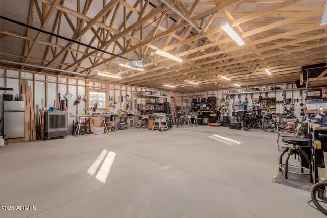 a view of parking garage with cars