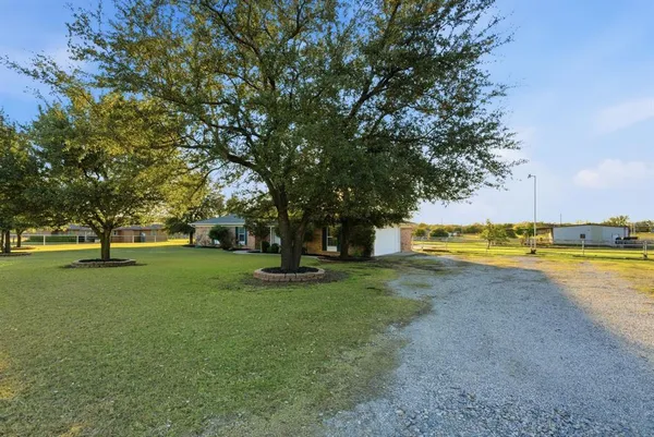 a view of swimming pool with trees and outdoor space