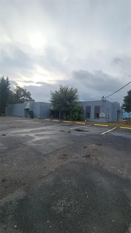 a view of an house with a street