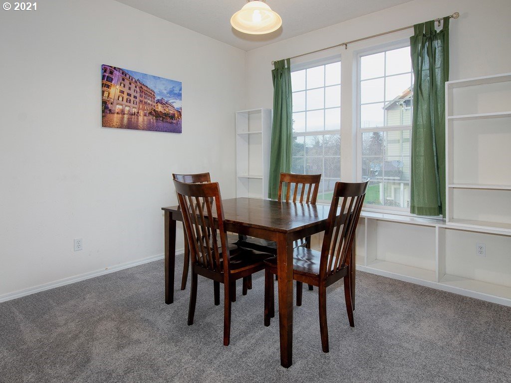 20078 Southwest Monson Street Beaverton, OR 97003 - Photo 12 of 32 a view of a dining room with furniture window and outside view