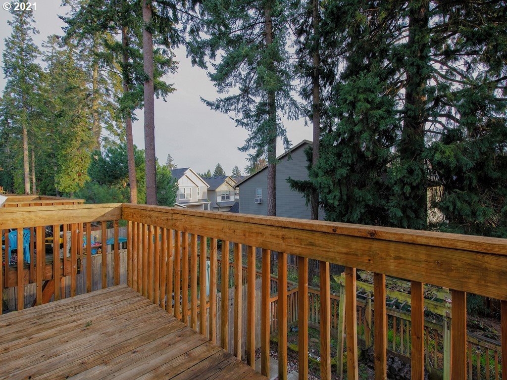 20078 Southwest Monson Street Beaverton, OR 97003 - Photo 14 of 32 a balcony of view with wooden floor and fence