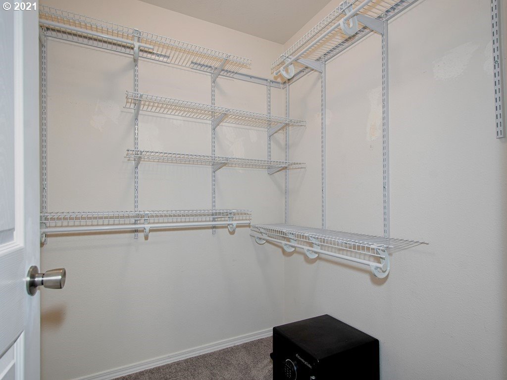 20078 Southwest Monson Street Beaverton, OR 97003 - Photo 18 of 32 a view of a room with racks on the wall
