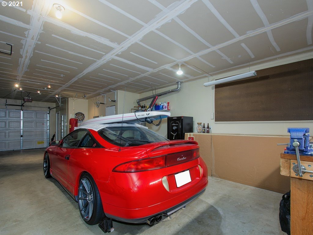 20078 Southwest Monson Street Beaverton, OR 97003 - Photo 27 of 32 a car parked in a garage