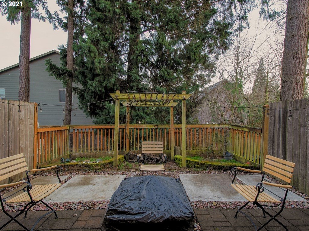 20078 Southwest Monson Street Beaverton, OR 97003 - Photo 31 of 32 a view of backyard with deck and outdoor seating