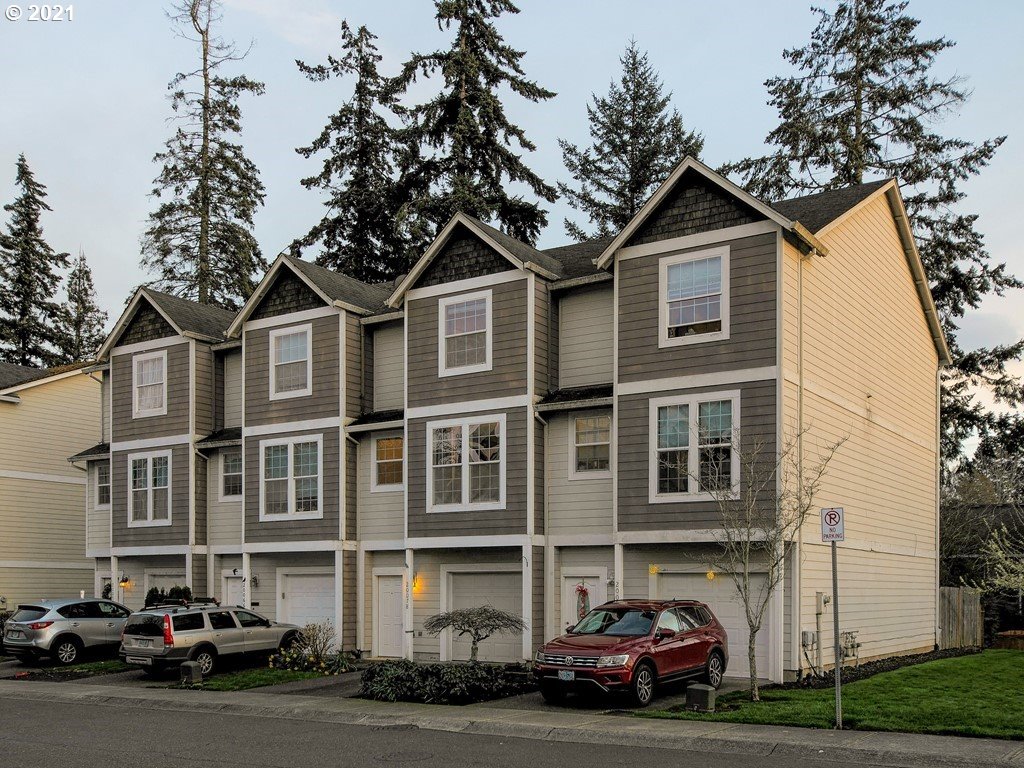 20078 Southwest Monson Street Beaverton, OR 97003 - Photo 32 of 32 a city street lined with buildings and cars