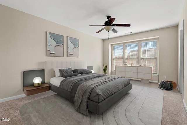 a view of a dining room with furniture a chandelier and wooden floor