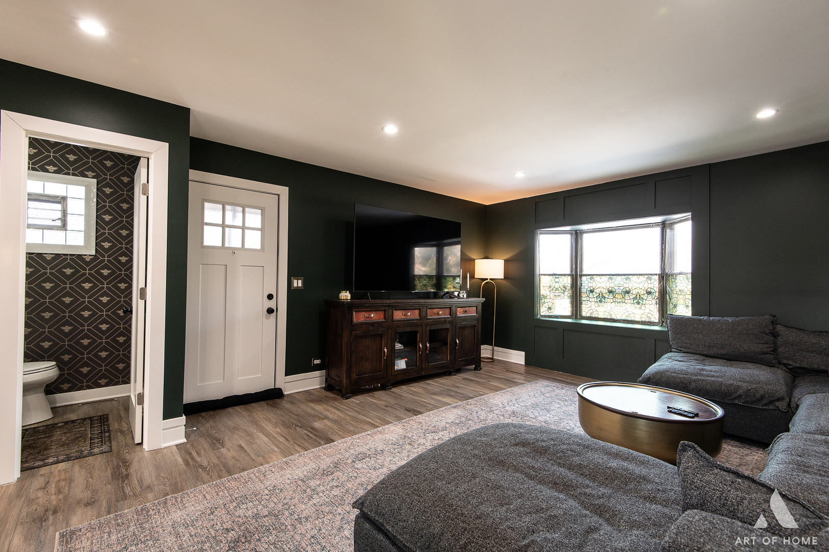 262 Lionel Road Riverside, IL 60546 - Photo 13 of 25 a living room with furniture and a flat screen tv