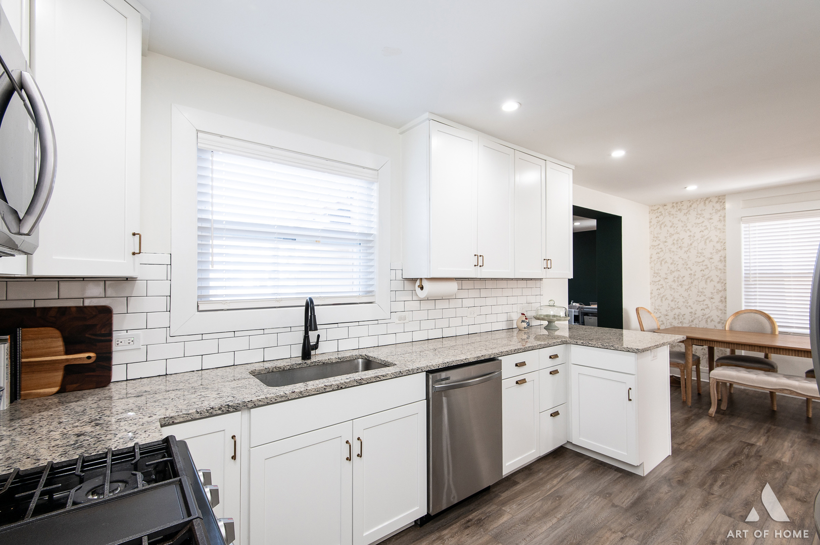 262 Lionel Road Riverside, IL 60546 - Photo 10 of 25 a kitchen with a sink stove and cabinets