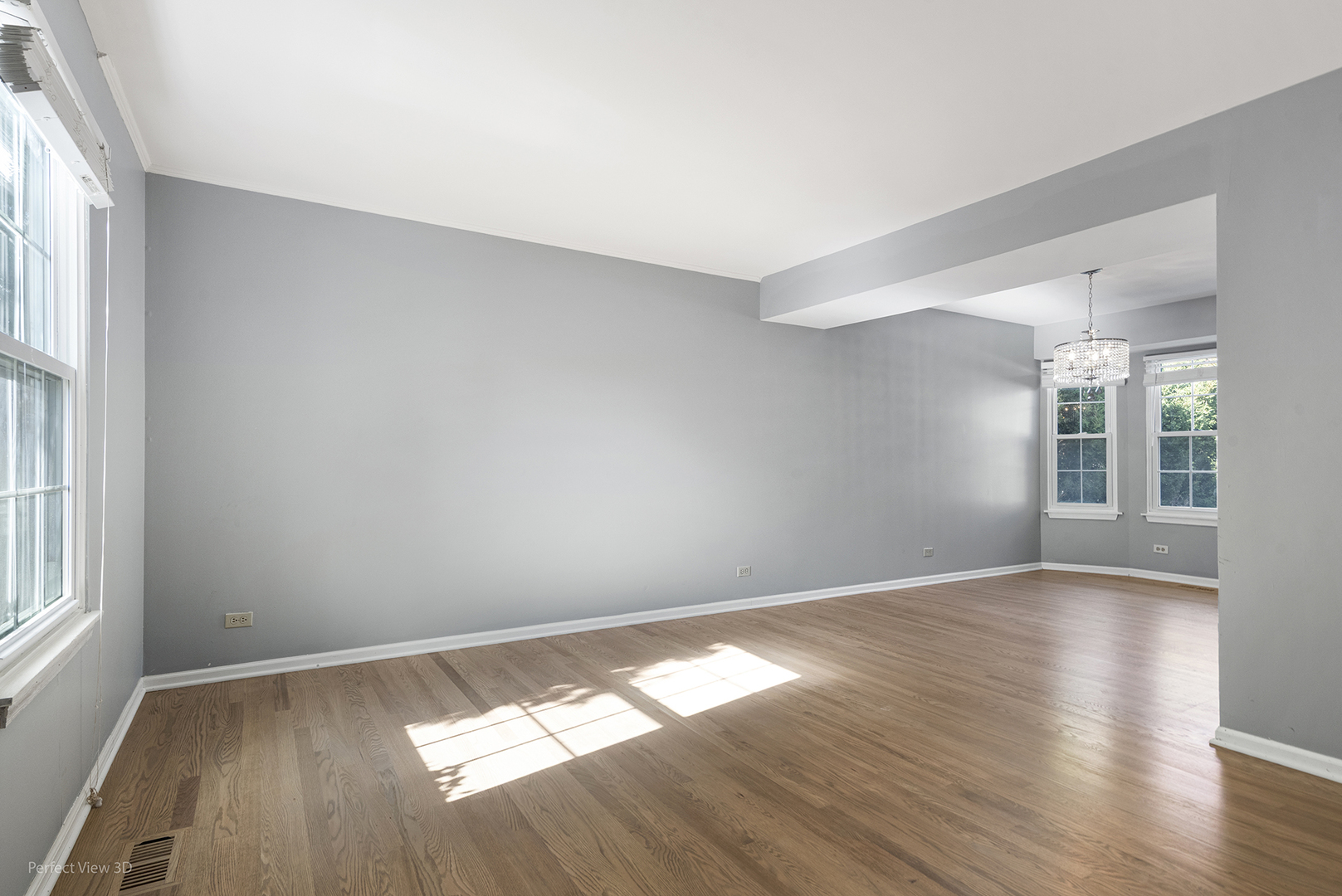 3290 Johnsbury Court Aurora, IL 60504 - Photo 3 of 31 an empty room with wooden floor and windows