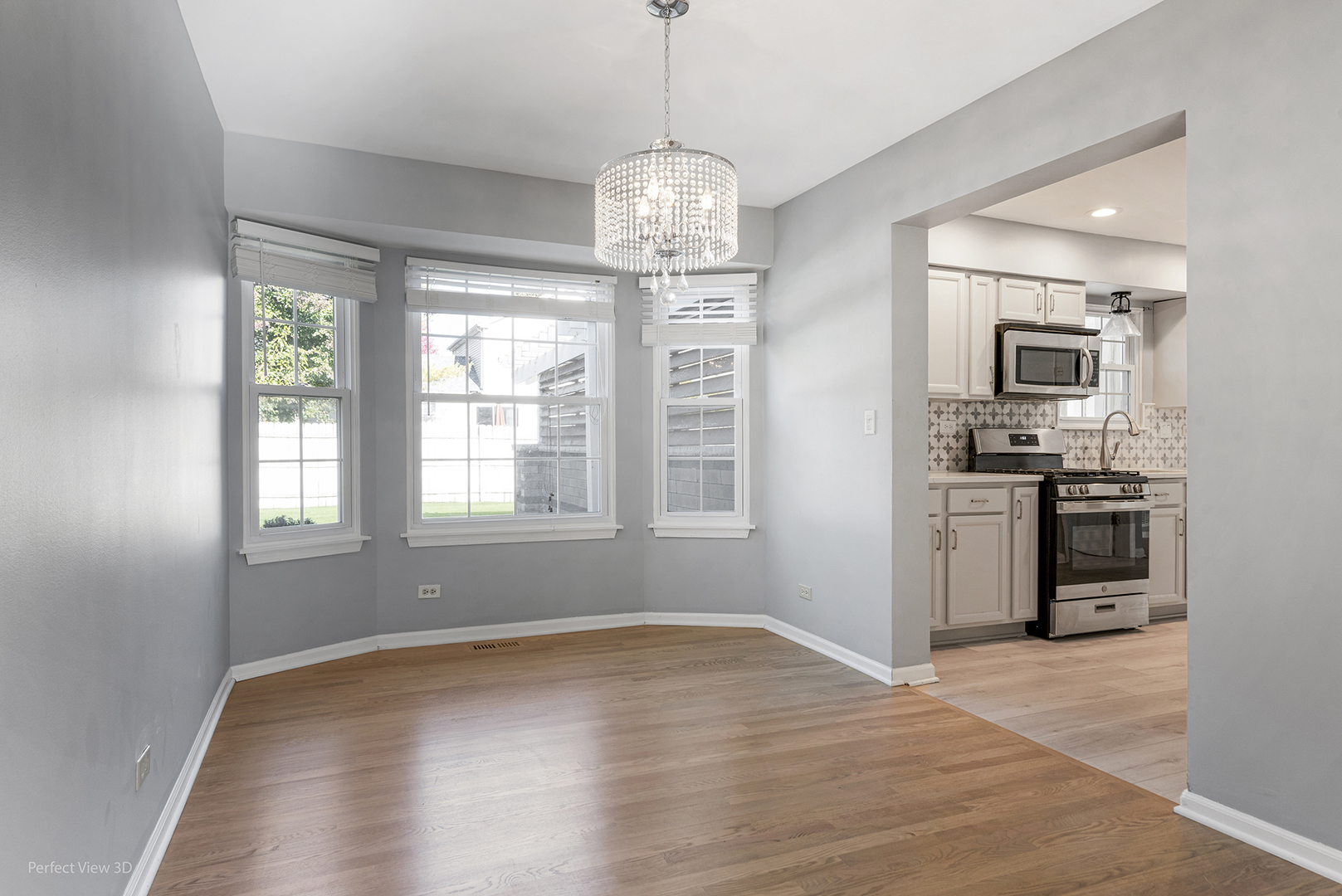 3290 Johnsbury Court Aurora, IL 60504 - Photo 4 of 31 a kitchen with stainless steel appliances granite countertop a refrigerator a sink dishwasher a stove and a refrigerator with wooden floor